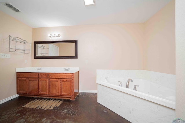 full bath featuring double vanity, concrete floors, a bath, baseboards, and visible vents