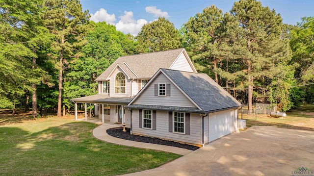 view of front facade featuring a porch, aphalt driveway, a shingled roof, a garage, and a front lawn