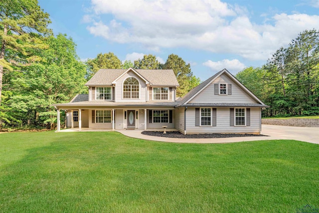 view of front of home featuring covered porch and a front lawn