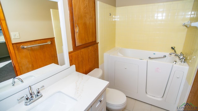 bathroom with wood walls, vanity, and toilet