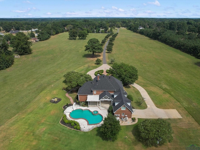 birds eye view of property with a rural view