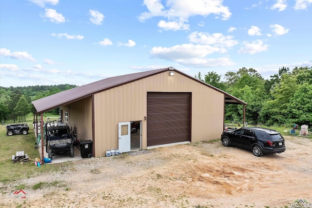 view of outdoor structure with a garage