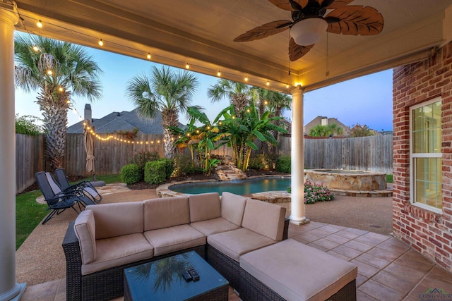 patio terrace at dusk with an outdoor living space, ceiling fan, and a fenced in pool