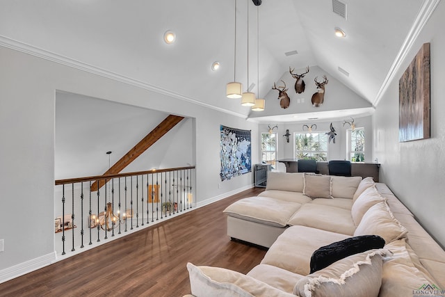 living room featuring hardwood / wood-style flooring, high vaulted ceiling, and crown molding