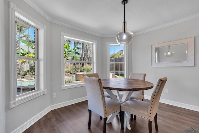 dining space with ornamental molding and dark wood-type flooring