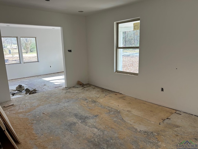 unfurnished room with a wealth of natural light