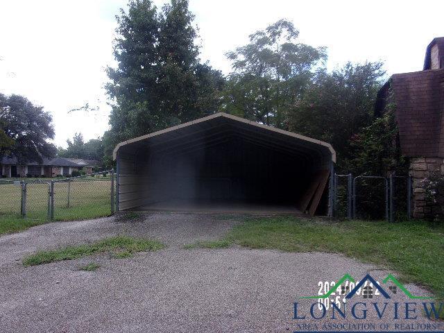 exterior space featuring a carport