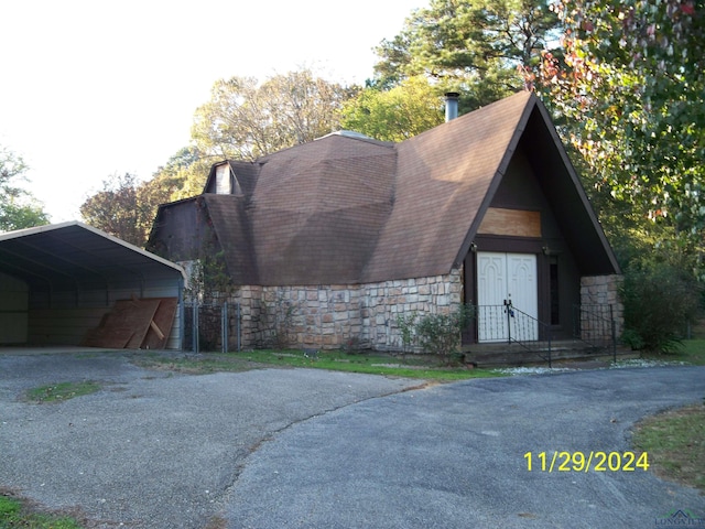 exterior space featuring a carport