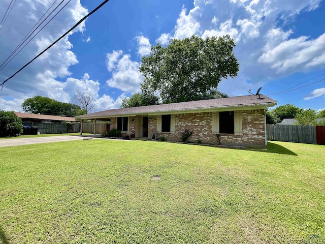 209 Lake Lamond Rd, Longview, TX 75604 - ranch-style house featuring concrete driveway, brick siding, and an attached carport