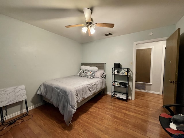 209 Lake Lamond Rd, Longview, TX 75604 - bedroom featuring wood finished floors and a ceiling fan