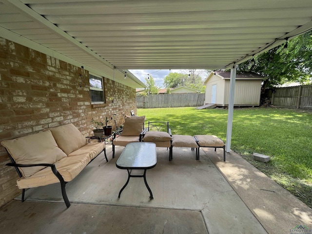 209 Lake Lamond Rd, Longview, TX 75604 - fenced backyard featuring an outdoor living space, a patio, and a storage unit