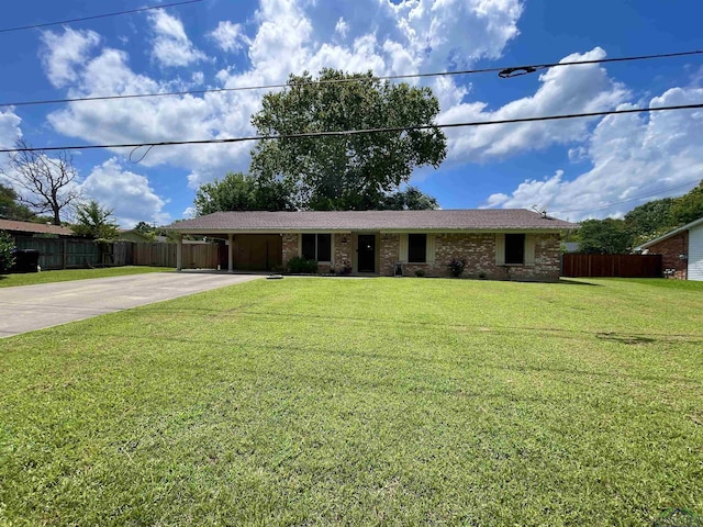 209 Lake Lamond Rd, Longview, TX 75604 - ranch-style home featuring driveway, a carport, and brick siding