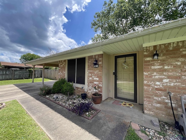 209 Lake Lamond Rd, Longview, TX 75604 - property entrance featuring brick siding