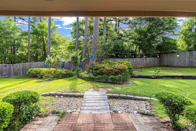 8 Honeysuckle Ln, Longview, TX 75605 - view of yard featuring view of wooded area