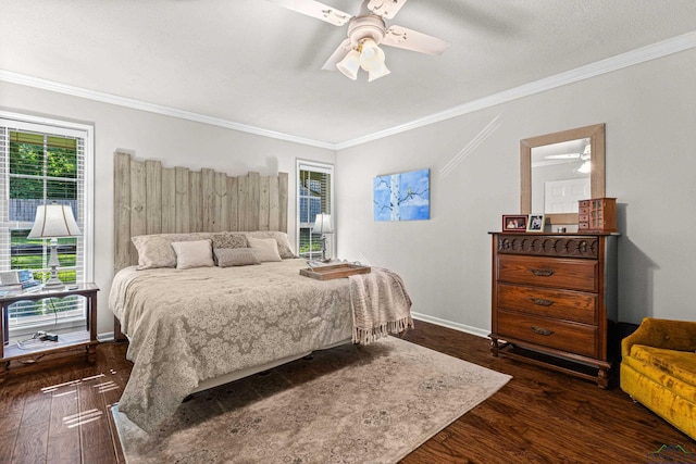 8 Honeysuckle Ln, Longview, TX 75605 - bedroom featuring dark wood-style flooring, crown molding, baseboards, and a ceiling fan