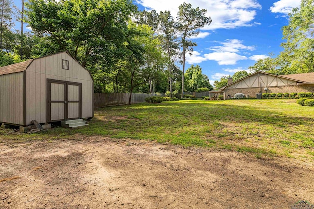 8 Honeysuckle Ln, Longview, TX 75605 - view of yard featuring an outbuilding and a storage unit