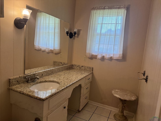 bathroom featuring tile patterned floors and vanity