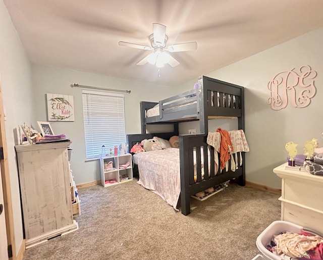carpeted bedroom with baseboards and ceiling fan