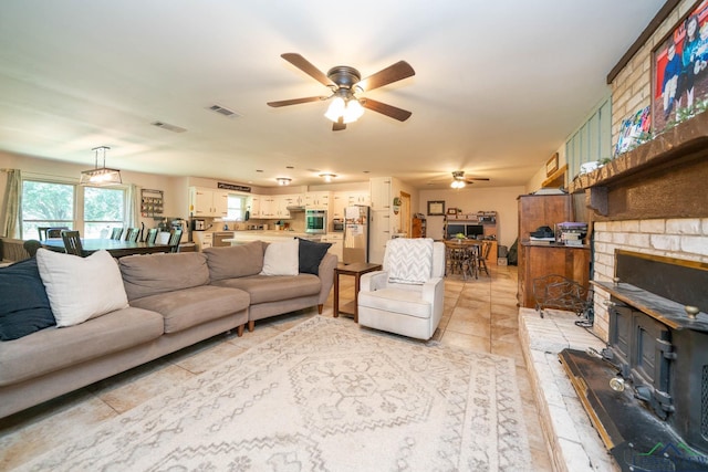 12545 Fm 968 W, Longview, TX 75602 - living room featuring a ceiling fan and light tile patterned floors