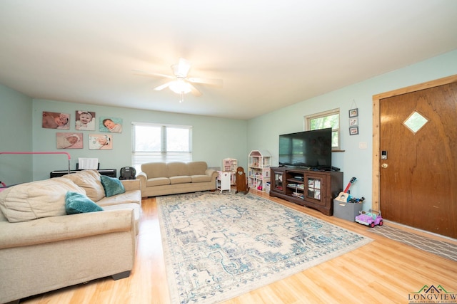 12545 Fm 968 W, Longview, TX 75602 - living area featuring wood finished floors and ceiling fan