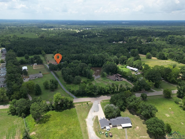 aerial view featuring a forest view