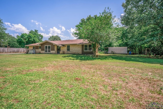 12545 Fm 968 W, Longview, TX 75602 - rear view of property featuring brick siding