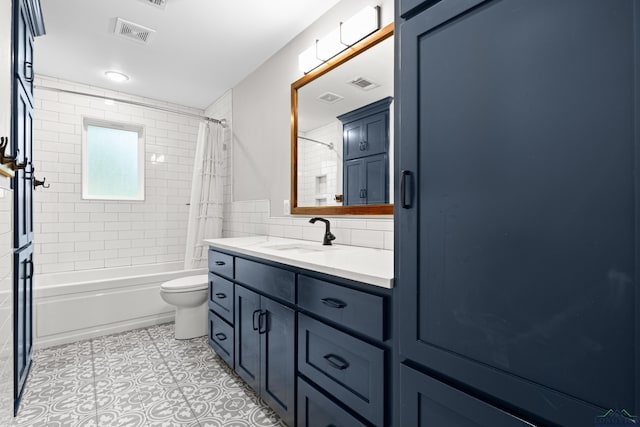 bathroom with visible vents, shower / bath combo with shower curtain, toilet, and vanity
