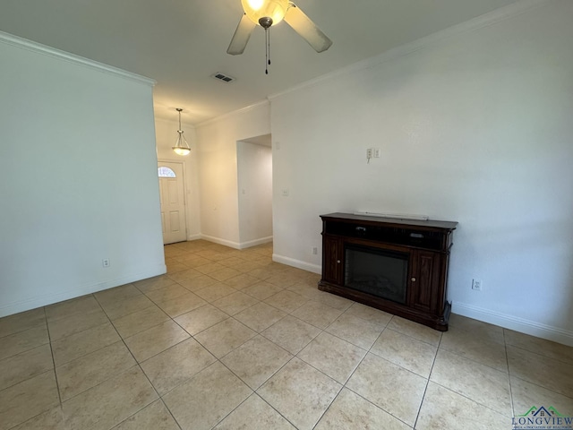 unfurnished living room with light tile patterned floors, ceiling fan, and ornamental molding