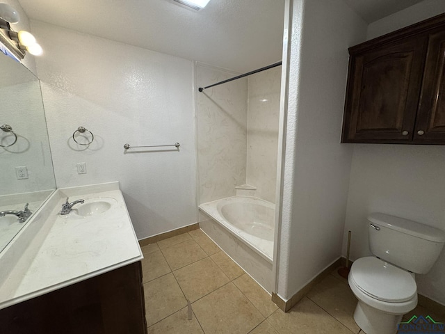 full bathroom featuring tile patterned flooring, vanity, bathing tub / shower combination, and toilet