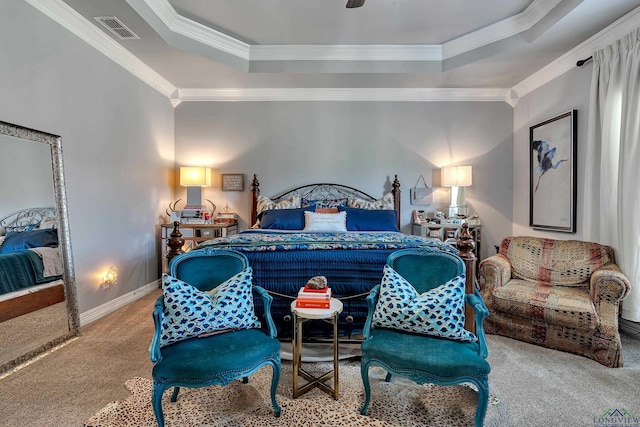 bedroom featuring carpet, a raised ceiling, ceiling fan, and ornamental molding