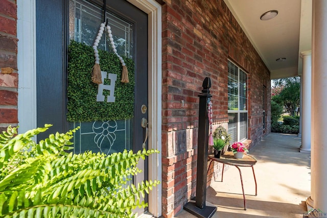 entrance to property with a porch