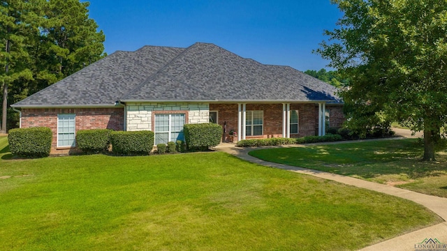 view of front of home featuring a front lawn