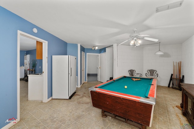 game room with ceiling fan and pool table