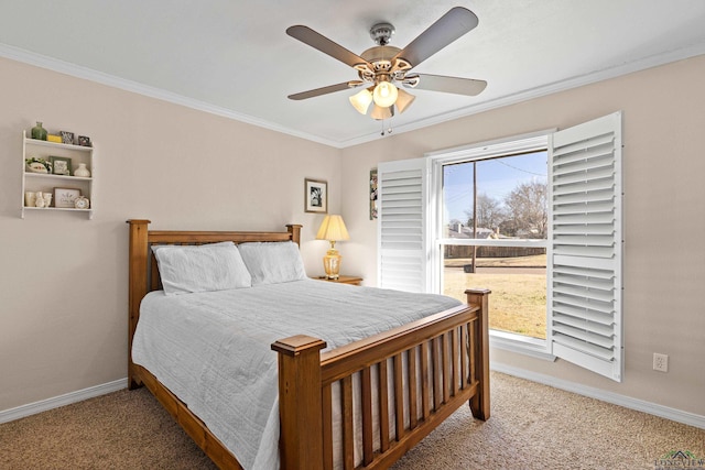 carpeted bedroom featuring ornamental molding and ceiling fan