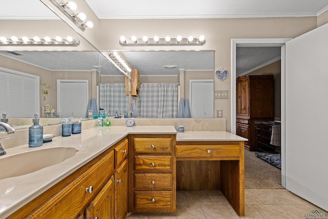 bathroom with tile patterned flooring, ornamental molding, and vanity