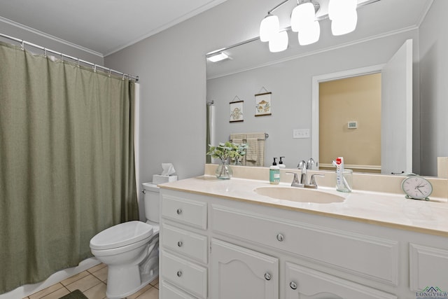 bathroom featuring crown molding, vanity, tile patterned floors, and toilet