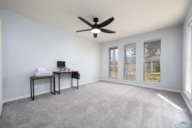 office area with carpet, baseboards, and a ceiling fan