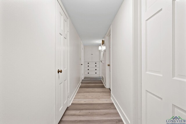 hallway featuring light hardwood / wood-style floors