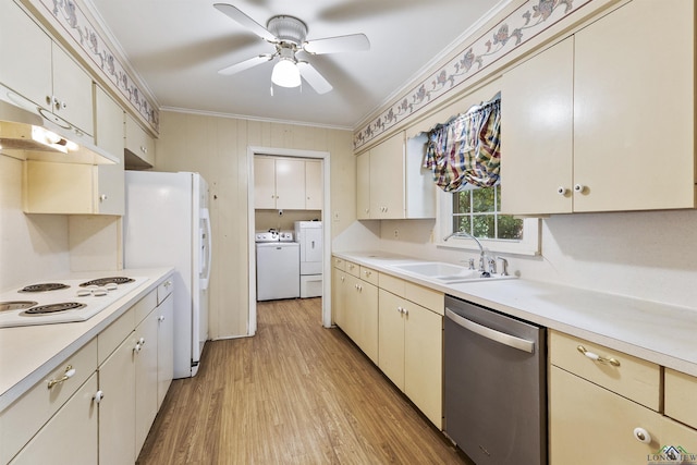 kitchen with white appliances, ceiling fan, sink, independent washer and dryer, and light hardwood / wood-style floors