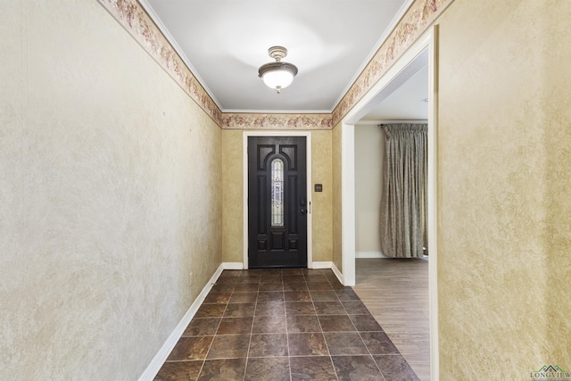 entrance foyer featuring crown molding