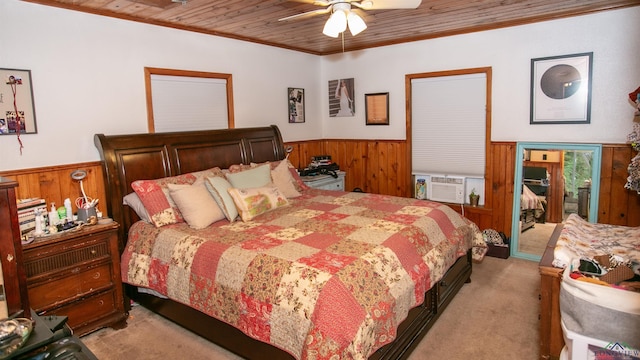 bedroom featuring ceiling fan, wooden ceiling, crown molding, cooling unit, and light carpet