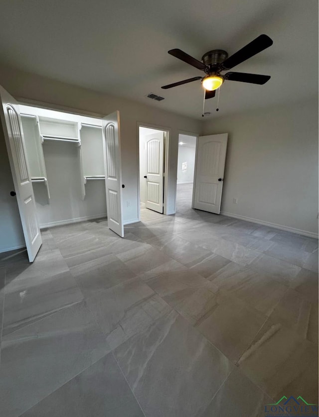 unfurnished bedroom featuring a closet and ceiling fan