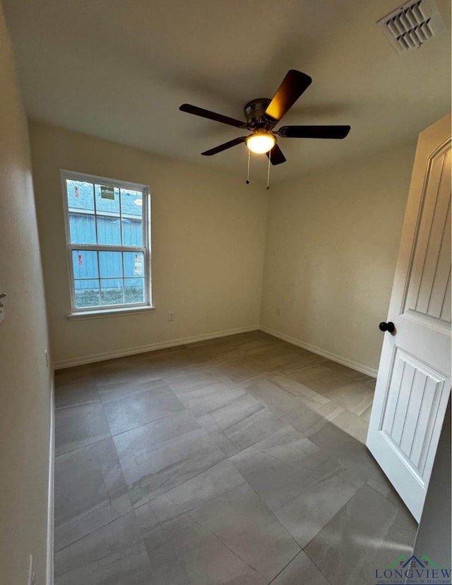 empty room with ceiling fan