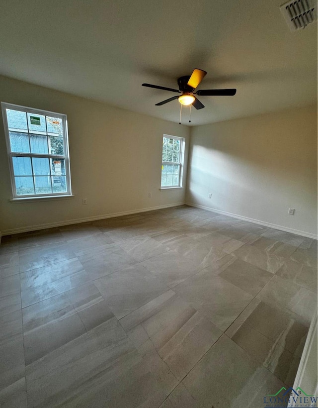 empty room with ceiling fan