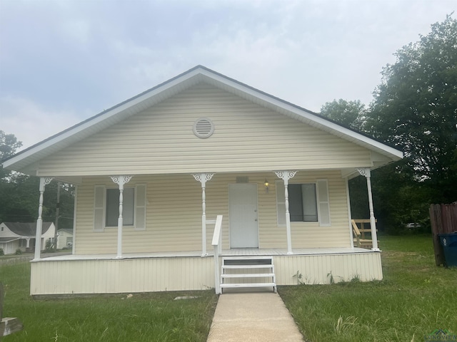 1609 Bomar St, Marshall, TX 75670 - view of front of property featuring a porch