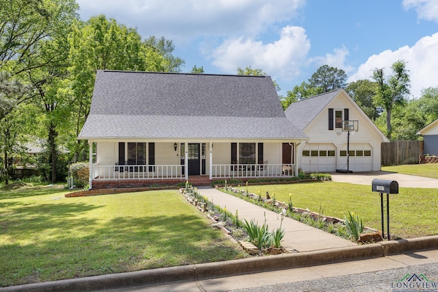 10887 Knollwood Dr, Tyler, TX 75703 - view of front of property featuring a porch, concrete driveway, and a shingled roof