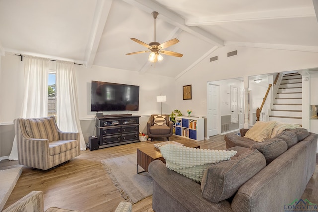 10887 Knollwood Dr, Tyler, TX 75703 - living room with light wood finished floors, ceiling fan, stairway, and baseboards