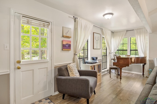 10887 Knollwood Dr, Tyler, TX 75703 - sitting room with wood finished floors, baseboards, and an office area