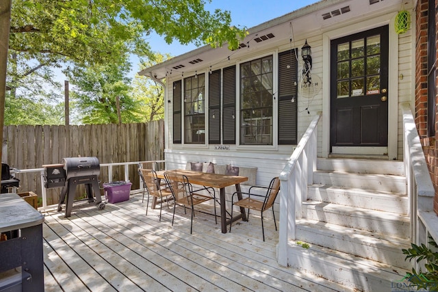 10887 Knollwood Dr, Tyler, TX 75703 - wooden terrace featuring entry steps, outdoor dining area, and grilling area
