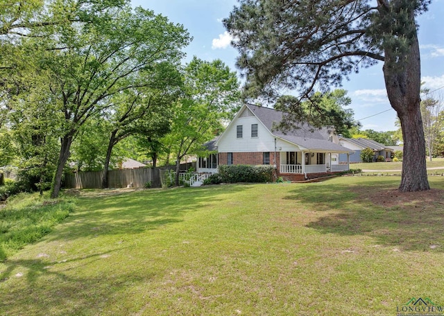 10887 Knollwood Dr, Tyler, TX 75703 - view of yard with covered porch